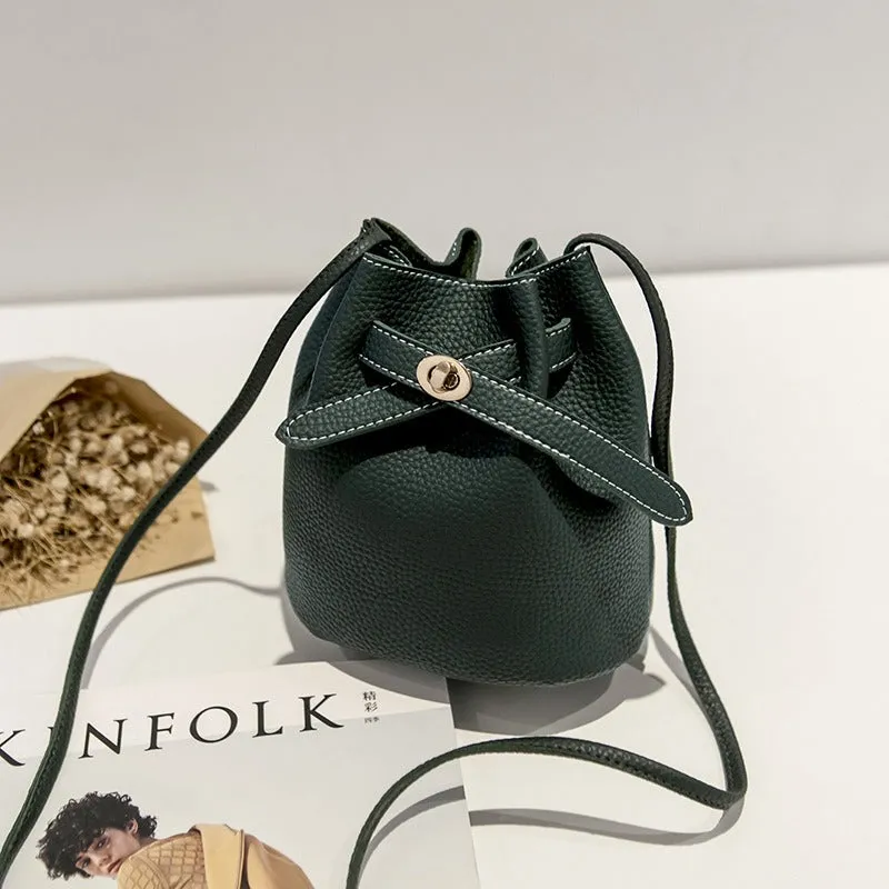 Guangzhou supply 2024 new simple bucket bag wide-band lock small bag Korean version casual solid color single shoulder