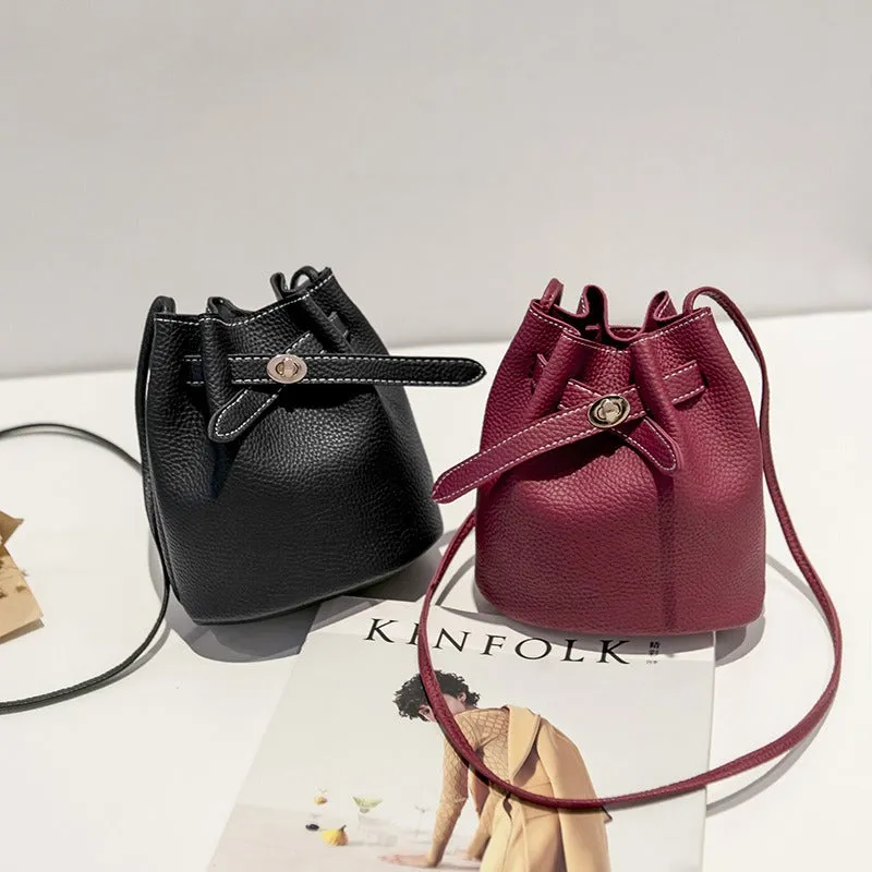 Guangzhou supply 2024 new simple bucket bag wide-band lock small bag Korean version casual solid color single shoulder