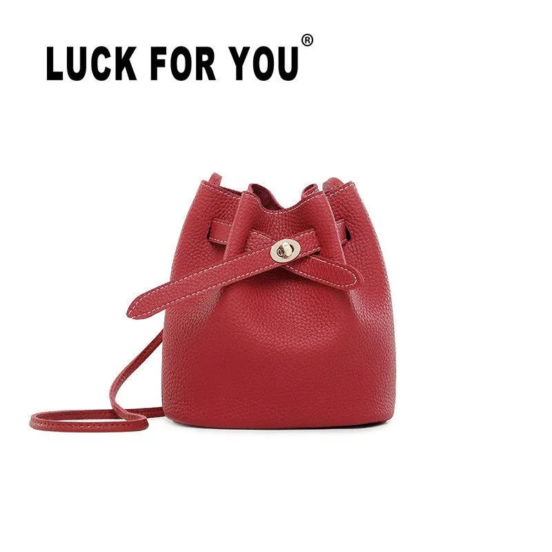 Guangzhou supply 2024 new simple bucket bag wide-band lock small bag Korean version casual solid color single shoulder