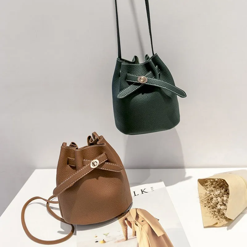 Guangzhou supply 2024 new simple bucket bag wide-band lock small bag Korean version casual solid color single shoulder